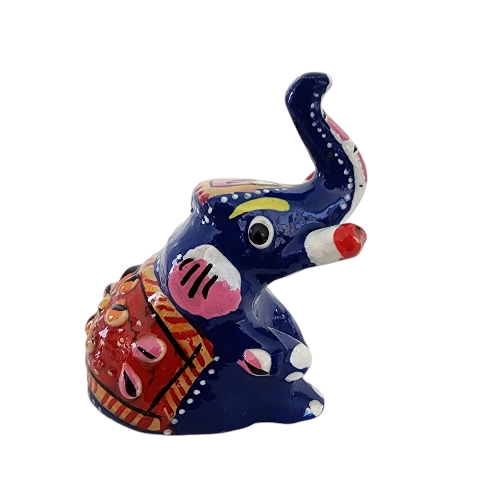 Sitting elephant figurine hand painted artisan made cast metal red on blue